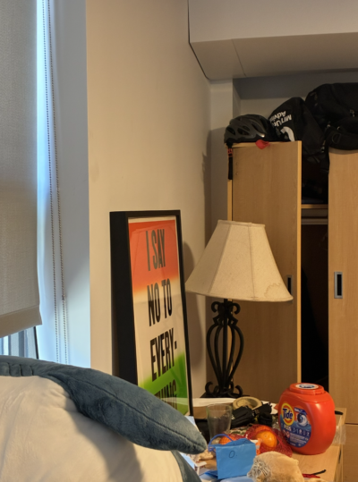 picture of my room: visible are a bike helmet, but also a lamp and a print saying "i say no to everything"