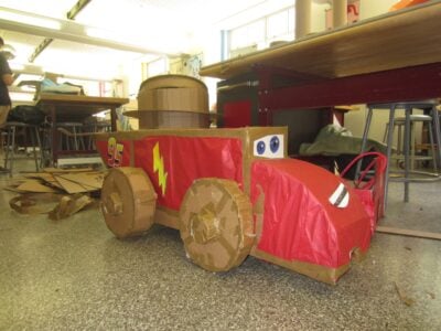 a cardboard lightning mcqueen in lab