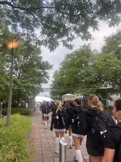 a photo of my team walking out to a game