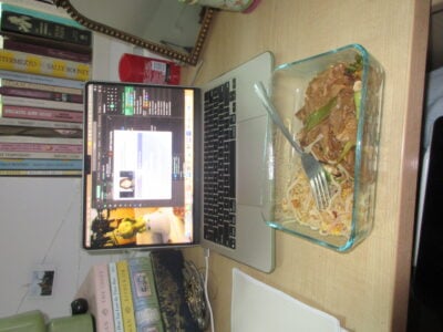 a view of a laptop and tupperware