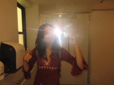 a mirror selfie with the flash on