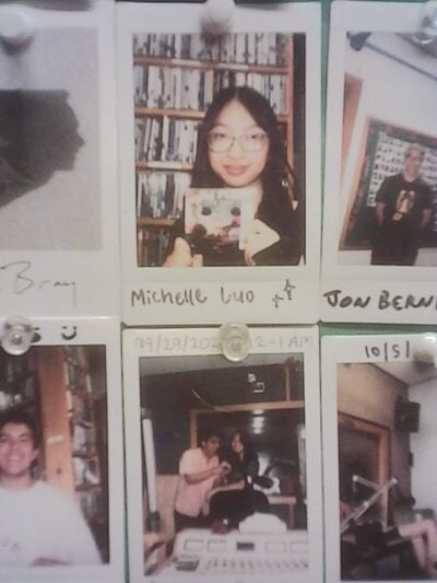 two polaroids pinned up on photo wall in WMBR