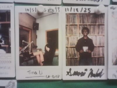 two polaroids pinned up on photo wall in WMBR