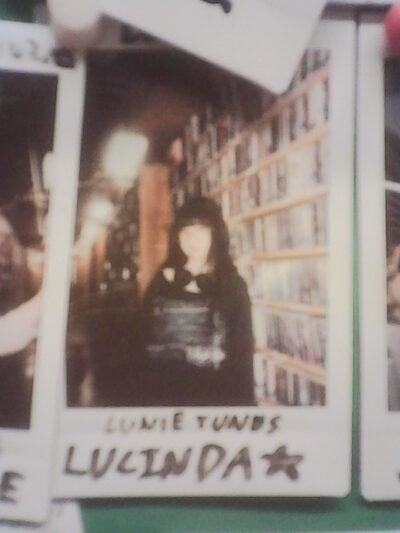 polaroid pinned up on photo wall in WMBR