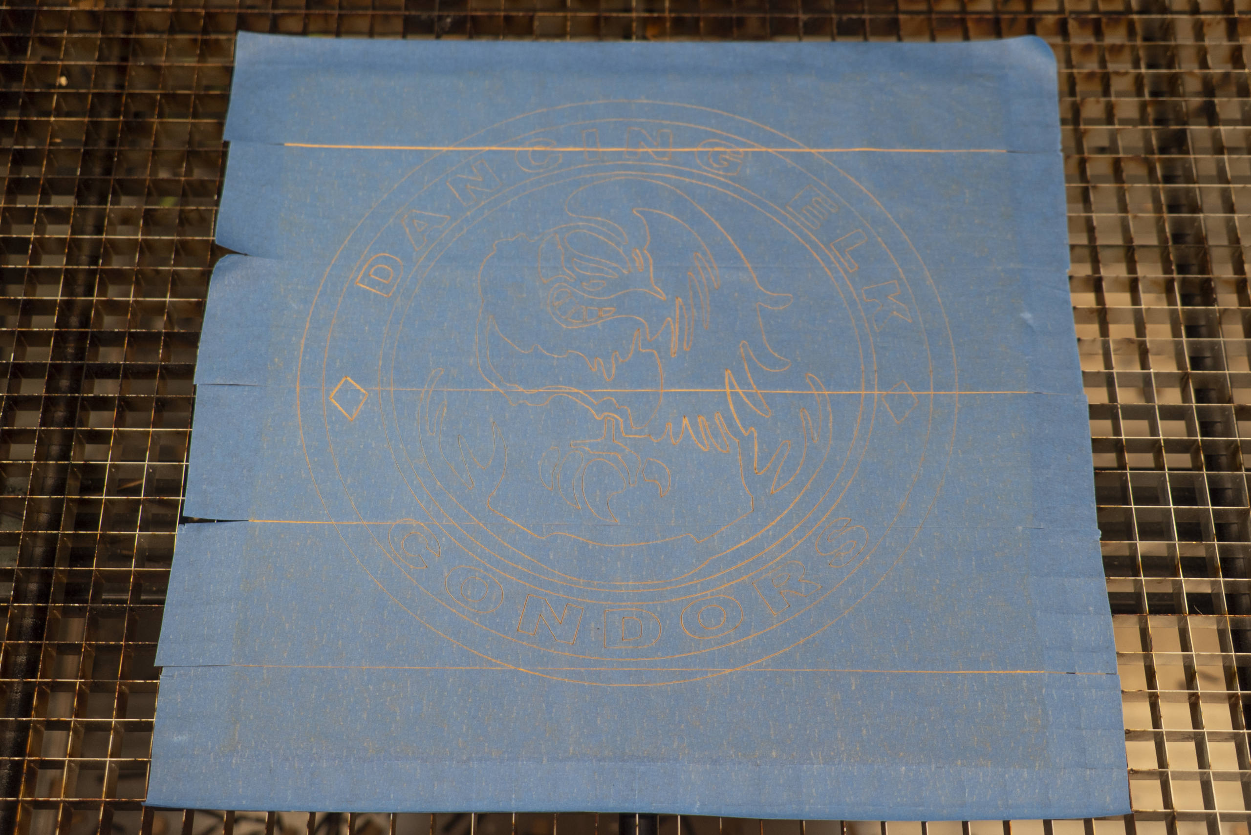graphic laser cut into fabric